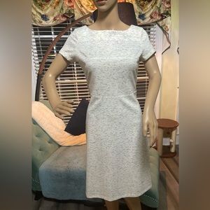 Business Dress, white with black strikes throughout. Size 2